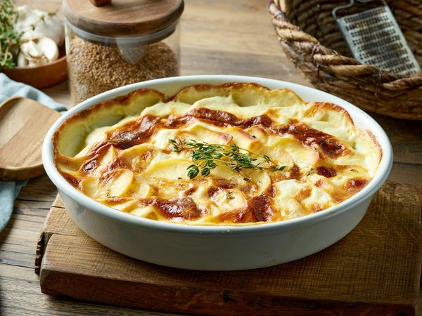 Comment réussir un gratin de courgettes à la mozzarella et jambon de Parme ?